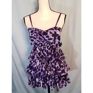 Spangle purple ruffel strappy top.